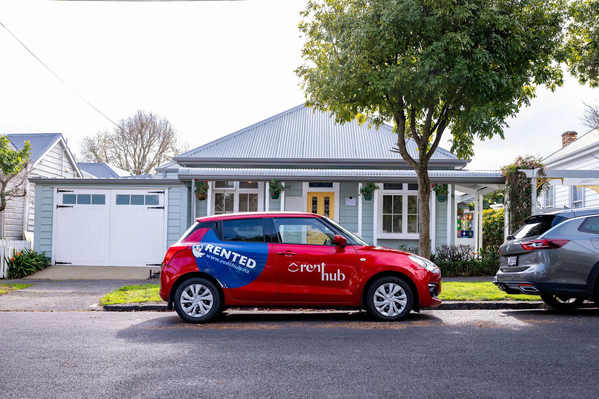 Renthub property management in Auckland – residential property with For Rent sign